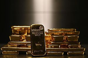 Gold Dips on Day, But up on Week