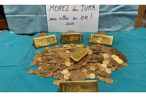 French Officials Perplexed By Gold Bars and Coins Found Stashed in Old House
